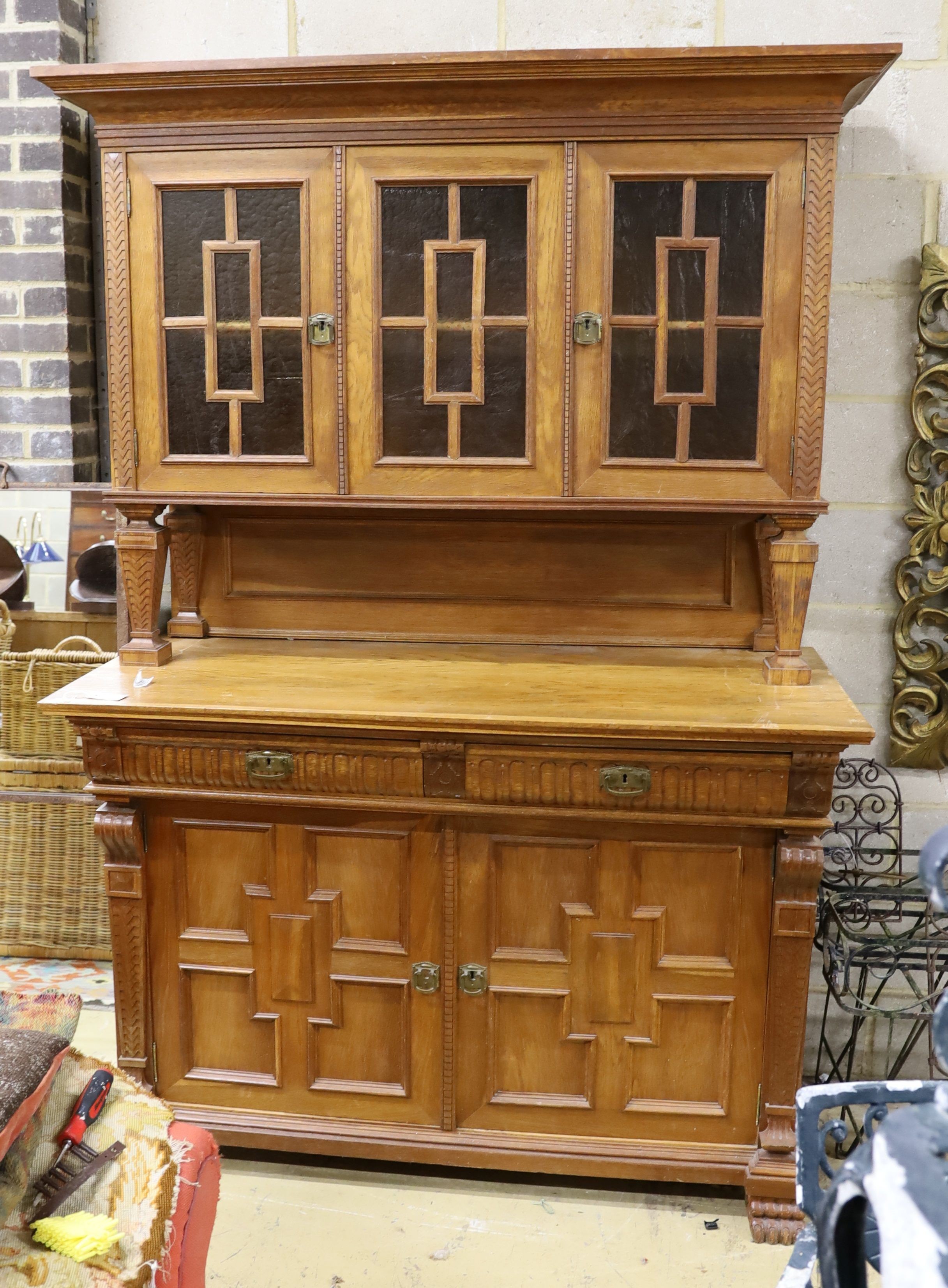 An early 20th century Continental oak buffet, length 148cm, depth 65cm, height 220cm